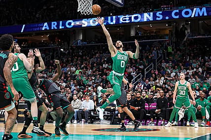 Mar 17, 2024; Washington, District of Columbia, USA; Boston Celtics forward Jayson Tatum (0) goes to the basket against the Washington Wizards during the first half of the game at Capital One Arena. Mandatory Credit: Scott Taetsch-USA TODAY Sports