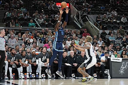 Mar 22, 2024; San Antonio, Texas, USA; Memphis Grizzlies forward Jaren Jackson Jr. (13) shoots over San Antonio Spurs forward Jeremy Sochan (10) in the first half at Frost Bank Center. Mandatory Credit: Daniel Dunn-USA TODAY Sports