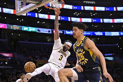 Mar 24, 2024; Los Angeles, California, USA;   Los Angeles Lakers forward Anthony Davis (3) reacts after he gets past Indiana Pacers guard Ben Sheppard (26) for a dunk in the second half at Crypto.com Arena. Mandatory Credit: Jayne Kamin-Oncea-USA TODAY Sports