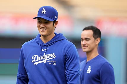 Mar 25, 2024; Los Angeles, California, USA; Los Angeles Dodgers designated hitter Shohei Ohtani (left) and interpreter Will Ireton before the game against the Los Angeles Angels at Dodger Stadium. Mandatory Credit: Kirby Lee-USA TODAY Sports