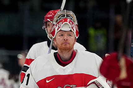 Olympics: Ice Hockey-Men Group C - DEN-LAT