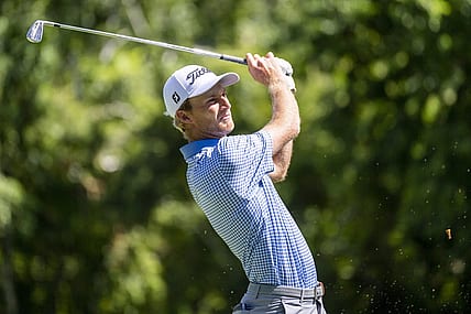Jul 29, 2022; Detroit, Michigan, USA; Will Zalatoris tees off on the par 3 ninth hole during the second round of the Rocket Mortgage Classic golf tournament. Mandatory Credit: Raj Mehta-USA TODAY Sports