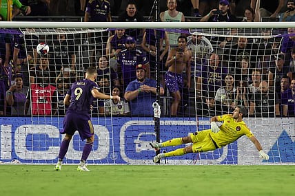 Jul 21, 2023; Orlando, FL, USA;  Orlando City forward Ercan Kara (9) scores a goal during the penalty kick shoot out after the game against Houston Dynamo at Exploria Stadium. Mandatory Credit: Cory Knowlton-USA TODAY Sports