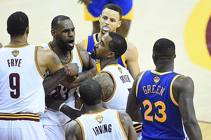 Jun 10, 2016; Cleveland, OH, USA; Cleveland Cavaliers forward LeBron James (23) exchanges words with Golden State Warriors forward Draymond Green (23) during the fourth quarter in game four of the NBA Finals at Quicken Loans Arena. The Warriors won 108-97. Mandatory Credit: David Richard-USA TODAY Sports