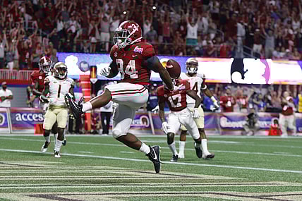 Alabama running back Damien Harris scores a touchdown against FSU in college football Week 1