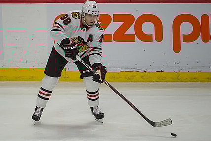 Jan 9, 2018; Ottawa, Ontario, CAN; Chicago Blackhawks right wing Patrick Kane (88) shoots the puck in the third period against the Ottawa Senators at Canadian Tire Centre. Mandatory Credit: Marc DesRosiers-USA TODAY Sports