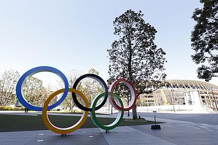 Mar 24, 2020; Tokyo, Japan; Olympic rings monument in front of National Stadium. On Monday the IOC announced that the Tokyo 2020 Summer Olympics Games would be postponed due to the COVID-19 coronavirus pandemic. Mandatory Credit: Yukihito Taguchi-USA TODAY Sports