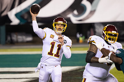 Jan 3, 2021; Philadelphia, Pennsylvania, USA; Washington Football Team quarterback Alex Smith (11) passes the ball against the Philadelphia Eagles during the first quarter at Lincoln Financial Field. Mandatory Credit: Bill Streicher-USA TODAY Sports
