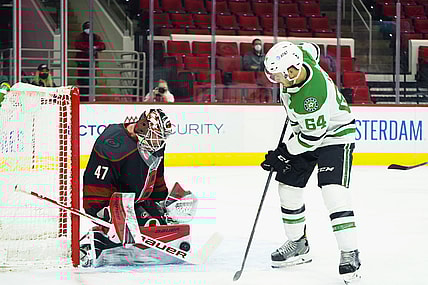 Jan 30, 2021; Raleigh, North Carolina, USA;  Carolina Hurricanes goaltender James Reimer (47) stops a first period shot against Dallas Stars center Tanner Kero (64) at PNC Arena. Mandatory Credit: James Guillory-USA TODAY Sports