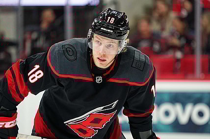 Dec 31, 2019; Raleigh, North Carolina, USA;  Carolina Hurricanes center Ryan Dzingel (18) at PNC Arena. The Carolina Hurricanes defeated the Montreal Canadiens 3-1. Mandatory Credit: James Guillory-USA TODAY Sports