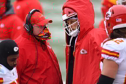 Oct 25, 2020; Denver, Colorado, USA; Kansas City Chiefs head coach Andy Reid speaks to quarterback Patrick Mahomes (15) in the first half against the Denver Broncos at Empower Field at Mile High. Mandatory Credit: Ron Chenoy-USA TODAY Sports