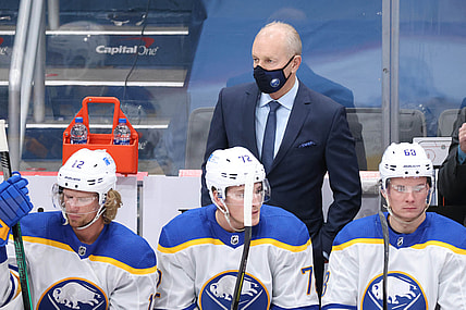 Jan 22, 2021; Washington, District of Columbia, USA; Buffalo Sabres head coach Ralph Krueger (M) looks on against the Washington Capitals in the first period at Capital One Arena. Mandatory Credit: Geoff Burke-USA TODAY Sports