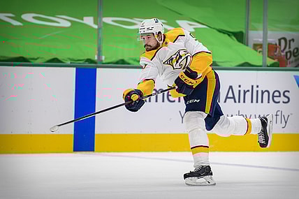 Jan 24, 2021; Dallas, Texas, USA; Nashville Predators left wing Filip Forsberg (9) in action during the game between the Dallas Stars and the Nashville Predators at the American Airlines Center. Mandatory Credit: Jerome Miron-USA TODAY Sports
