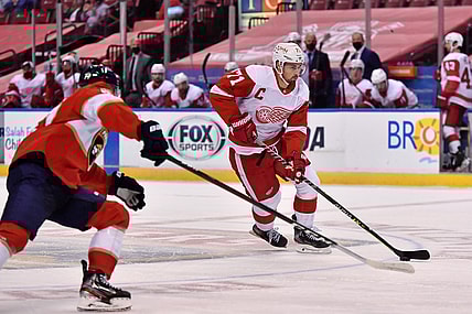 Feb 7, 2021; Sunrise, Florida, USA; Detroit Red Wings center Dylan Larkin (71) skates with the puck against the Florida Panthers during the first period at BB&T Center. Mandatory Credit: Jasen Vinlove-USA TODAY Sports