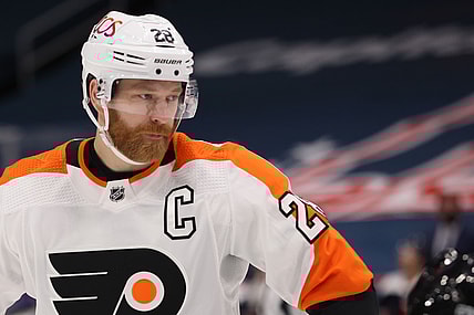 Feb 7, 2021; Washington, District of Columbia, USA; Philadelphia Flyers center Claude Giroux (28) stands on the ice against the Washington Capitals at Capital One Arena. Mandatory Credit: Geoff Burke-USA TODAY Sports