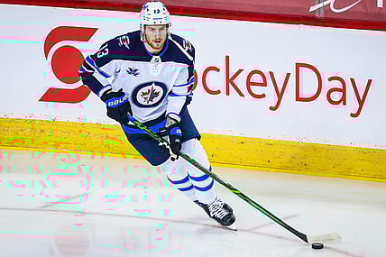 Feb 9, 2021; Calgary, Alberta, CAN; Winnipeg Jets center Pierre-Luc Dubois (13) warms up before the game against the Calgary Flames at Scotiabank Saddledome. Mandatory Credit: Sergei Belski-USA TODAY Sports