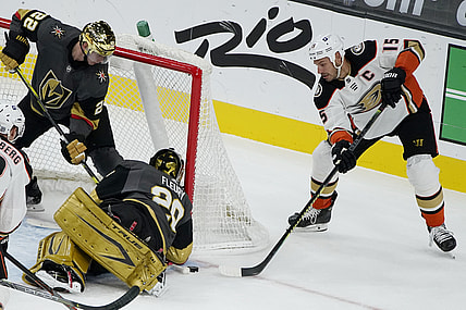 Feb 11, 2021; Las Vegas, Nevada, USA; Anaheim Ducks center Ryan Getzlaf (15) attempts a shot on Vegas Golden Knights goaltender Marc-Andre Fleury (29) during the first period at T-Mobile Arena. Mandatory Credit: John Locher/Pool Photos-USA TODAY Sports