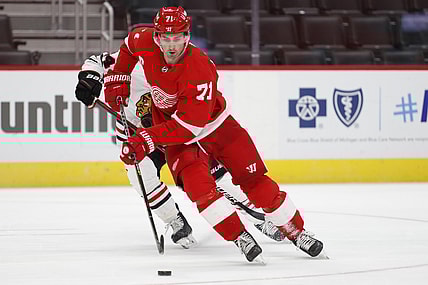 Feb 15, 2021; Detroit, Michigan, USA; Detroit Red Wings center Dylan Larkin (71) skates with the puck during the third period against the Chicago Blackhawks at Little Caesars Arena. Mandatory Credit: Raj Mehta-USA TODAY Sports