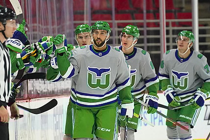 Feb 19, 2021; Raleigh, North Carolina, USA;  Carolina Hurricanes center Vincent Trocheck (16) celebrates his second period goal against the Chicago Blackhawks at PNC Arena. Mandatory Credit: James Guillory-USA TODAY Sports