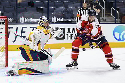 Feb 20, 2021; Columbus, Ohio, USA; Nashville Predators goaltender Pekka Rinne (35) reacts as Columbus Blue Jackets left wing Nick Foligno (71) deflects the puck in the air in the first period at Nationwide Arena. Mandatory Credit: Aaron Doster-USA TODAY Sports