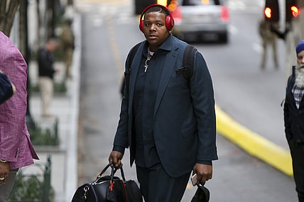 Jan 27, 2019; Atlanta, GA, USA; New England Patriots offensive tackle Trent Brown (77) arrives at the Hyatt Regency Atlanta. Mandatory Credit: Brett Davis-USA TODAY Sports