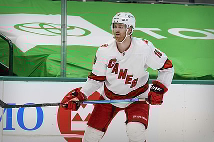 Feb 11, 2021; Dallas, Texas, USA; Carolina Hurricanes defenseman Dougie Hamilton (19) in action during the game between the Dallas Stars and the Carolina Hurricanes at the American Airlines Center. Mandatory Credit: Jerome Miron-USA TODAY Sports