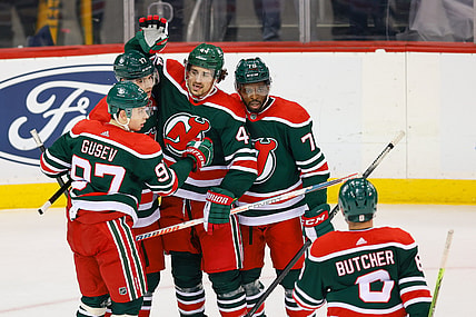 Mar 2, 2021; Newark, New Jersey, USA; New Jersey Devils left wing Miles Wood (44) celebrates with teammates after scoring a goal against the New York Islanders during the third period at Prudential Center. Mandatory Credit: Vincent Carchietta-USA TODAY Sports