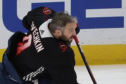 Feb 25, 2021; Washington, District of Columbia, USA; Washington Capitals left wing Alex Ovechkin (8) shoots during warmups in a warmup jersey observing Capitals Black History Night prior to their game against the Pittsburgh Penguins at Capital One Arena. Mandatory Credit: Geoff Burke-USA TODAY Sports