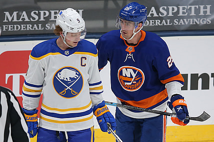 Mar 7, 2021; Uniondale, New York, USA; New York Islanders center Brock Nelson (29) talks to Buffalo Sabres center Jack Eichel (9) during the second period at Nassau Veterans Memorial Coliseum. Mandatory Credit: Brad Penner-USA TODAY Sports