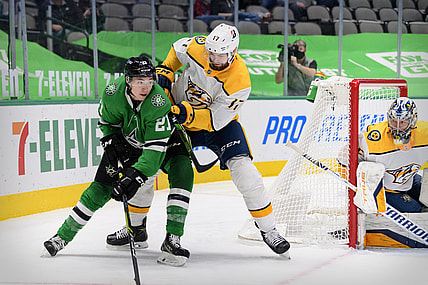 Mar 7, 2021; Dallas, Texas, USA; Nashville Predators defenseman Ben Harpur (17) defends against Dallas Stars left wing Jason Robertson (21) during the second period at the American Airlines Center. Mandatory Credit: Jerome Miron-USA TODAY Sports