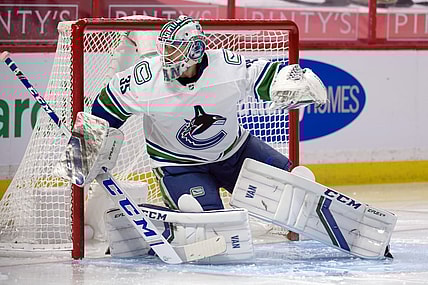 Mar 15, 2021; Ottawa, Ontario, CAN; Vancouver Canucks goalie Thatcher Demko (35) warms up prior to the start of the second period against the Ottawa Senators at the Canadian Tire Centre. Mandatory Credit: Marc DesRosiers-USA TODAY Sports