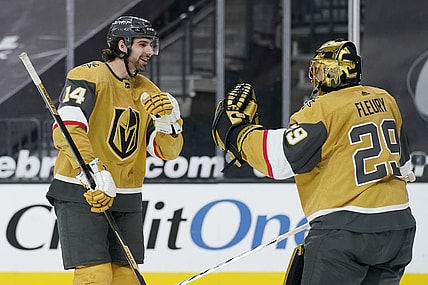 Mar 17, 2021; Las Vegas, Nevada, USA; Vegas Golden Knights goaltender Marc-Andre Fleury (right) celebrates after a goal by defenseman Nicolas Hague (14) against the San Jose Sharks during the third period at T-Mobile Arena. Mandatory Credit:  John Locher/POOL PHOTOS-USA TODAY Sports