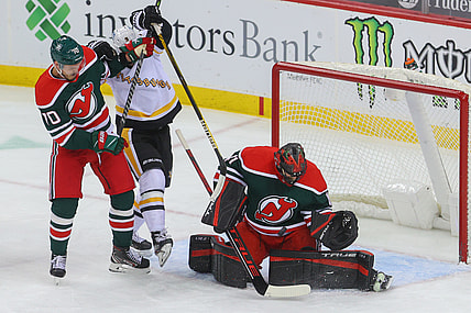 Mar 20, 2021; Newark, New Jersey, USA; New Jersey Devils goaltender Scott Wedgewood (41) makes a save during the first period of their game against the Pittsburgh Penguins at Prudential Center. Mandatory Credit: Ed Mulholland-USA TODAY Sports