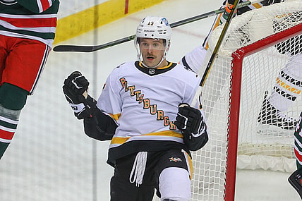 Mar 20, 2021; Newark, New Jersey, USA; Pittsburgh Penguins right wing Bryan Rust (17) celebrates his goal during the second period of their game against the New Jersey Devils at Prudential Center. Mandatory Credit: Ed Mulholland-USA TODAY Sports