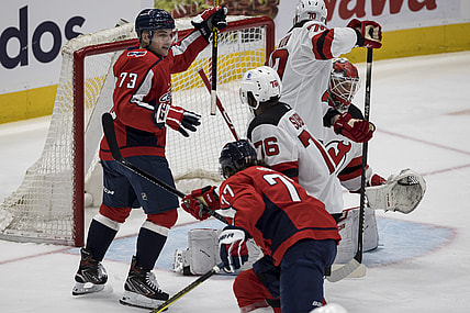 Mar 25, 2021; Washington, District of Columbia, USA; Washington Capitals left wing Conor Sheary (73) celebrates after defenseman Dmitry Orlov (9) not pictured scores a goal against the New Jersey Devils during the first period at Capital One Arena. Mandatory Credit: Scott Taetsch-USA TODAY Sports