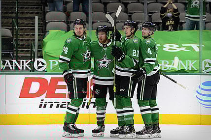 Mar 25, 2021; Dallas, Texas, USA; Dallas Stars left wing Roope Hintz (24) and center Joe Pavelski (16) and left wing Jason Robertson (21) and defenseman Miro Heiskanen (4) celebrates a goal scored by Pavelski against the Tampa Bay Lightning during the second period at the American Airlines Center. Mandatory Credit: Jerome Miron-USA TODAY Sports