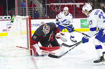 Mar 27, 2021; Raleigh, North Carolina, USA;  Carolina Hurricanes goaltender James Reimer (47) stops Tampa Bay Lightning center Yanni Gourde (37) shot during the first period at PNC Arena. Mandatory Credit: James Guillory-USA TODAY Sports