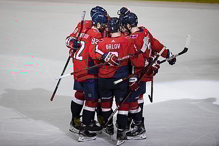 Mar 28, 2021; Washington, District of Columbia, USA; Washington Capitals right wing T.J. Oshie (77) celebrates with center Evgeny Kuznetsov (92) defenseman Dmitry Orlov (9) left wing Alex Ovechkin (8) and defenseman Justin Schultz (2) after scoring a goal against the New York Rangers during the third period at Capital One Arena. Mandatory Credit: Scott Taetsch-USA TODAY Sports