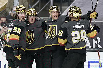 Mar 29, 2021; Las Vegas, Nevada, USA; Vegas Golden Knights celebrate after a goal by left wing Tomas Nosek (second from right) against the Los Angeles Kings during the second period at T-Mobile Arena. Mandatory Credit: John Locher/POOL PHOTOS-USA TODAY Sports