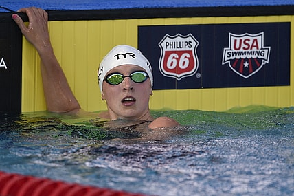 Jul 25, 2018; Irvine, CA, USA; Katie Ledecky looks at her time after winning the Women's 800 LC Meter Freestyle Final during the 2018 USA Swimming Phillips 66 National Championships swim meet at William Woollet, Jr. Aqua Center. Mandatory Credit: Kelvin Kuo-USA TODAY Sports