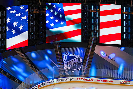 Aug 12, 2020; Edmonton, Alberta, CAN; General view of American flag and NHL logo prior to the game between the St. Louis Blues and the Vancouver Canucks in game one of the first round of the 2020 Stanley Cup Playoffs at Rogers Place. Mandatory Credit: Sergei Belski-USA TODAY Sports