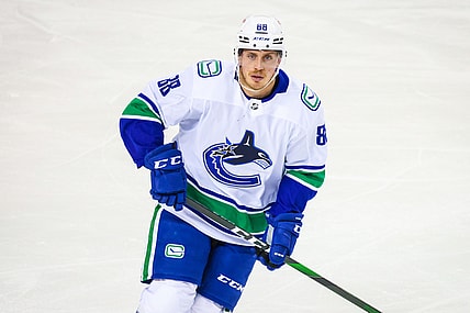 Feb 17, 2021; Calgary, Alberta, CAN; Vancouver Canucks defenseman Nate Schmidt (88) skates against the Calgary Flames during the first period at Scotiabank Saddledome. Mandatory Credit: Sergei Belski-USA TODAY Sports