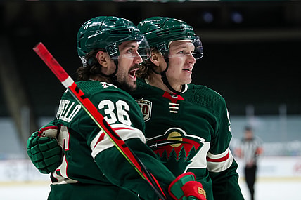 Mar 25, 2021; Saint Paul, Minnesota, USA; Minnesota Wild right wing Mats Zuccarello (36) celebrates with Minnesota Wild left wing Kirill Kaprizov (97) after Kaprizov scored a goal against the St. Louis Blues in the second period at Xcel Energy Center. Mandatory Credit: David Berding-USA TODAY Sports