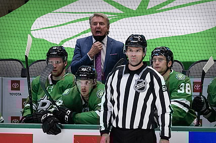Mar 25, 2021; Dallas, Texas, USA; Tampa Bay Lightning head coach Rick Bowness yells to his team during the third period against the Tampa Bay Lightning at the American Airlines Center. Mandatory Credit: Jerome Miron-USA TODAY Sports