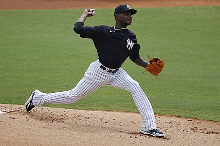 Mar 29, 2021; Tampa, Florida, USA; New York Yankees starting pitcher Domingo German (55) throws a pitch during the first inning against the Detroit Tigers at George M. Steinbrenner Field. Mandatory Credit: Kim Klement-USA TODAY Sports
