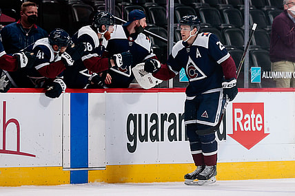 Apr 2, 2021; Denver, Colorado, USA; Colorado Avalanche center Nathan MacKinnon (29) celebrates with the bench after his second goal of the game against the St. Louis Blues at Ball Arena. Mandatory Credit: Isaiah J. Downing-USA TODAY Sports