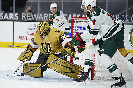 Apr 3, 2021; Las Vegas, Nevada, USA; Vegas Golden Knights goaltender Marc-Andre Fleury (29) blocks a shot by the Minnesota Wild during the first period at T-Mobile Arena. Mandatory Credit: John Locher/POOL PHOTOS-USA TODAY Sports