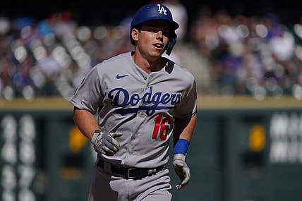 Apr 4, 2021; Denver, Colorado, USA; Los Angeles Dodgers catcher Will Smith (16) runs out his solo home run in the eighth inning against the against the Colorado Rockies at Coors Field. Mandatory Credit: Ron Chenoy-USA TODAY Sports