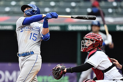 Apr 5, 2021; Cleveland, Ohio, USA; Kansas City Royals second baseman Whit Merrifield (15) hits a sacrifice fly during the seventh inning against the Cleveland Indians at Progressive Field. Mandatory Credit: Ken Blaze-USA TODAY Sports