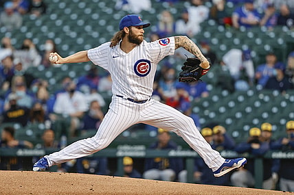 Apr 5, 2021; Chicago, Illinois, USA; Chicago Cubs starting pitcher Trevor Williams (32) delivers against the Milwaukee Brewers during the first inning at Wrigley Field. Mandatory Credit: Kamil Krzaczynski-USA TODAY Sports
